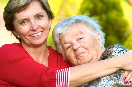 family caregiver taking care of elderly loved one
